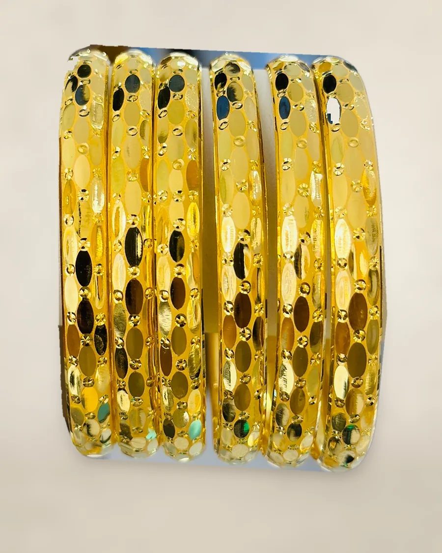 Stack of 21K gold bangles