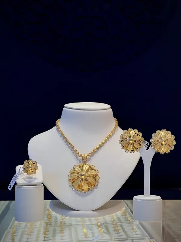 Floral pendant chain set with earrings and ring
