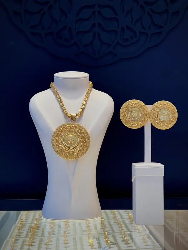 Round medallion necklace and earring set
